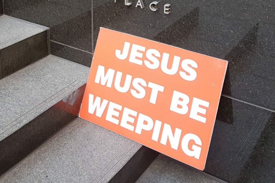 Sign outside Royal Commission comments on Catholic Church. Image: Billy Cooper/ABC News