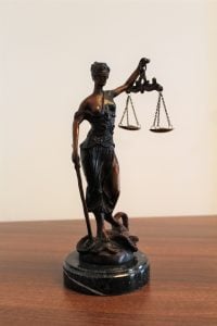 Lady Justice, a woman who is symbol of the law and courts