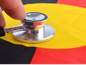 Medical stethoscope on the Aboriginal flag