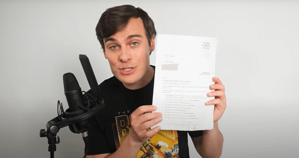 YouTuber Jordan Shanks, aka "FriendlyJordies", displaying the statement of claim in his defamation matter