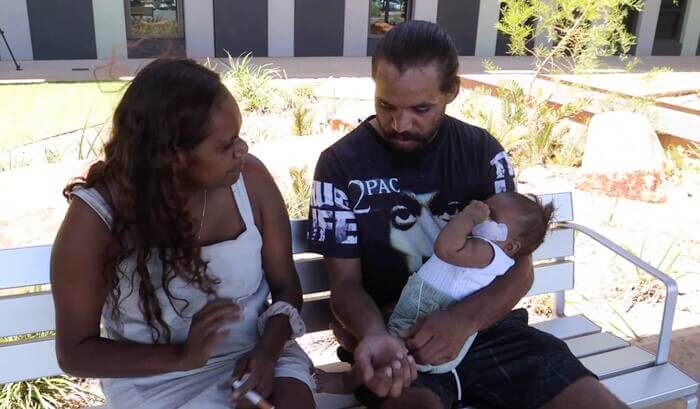 Terrance Kelly Flowers with his partner and young baby