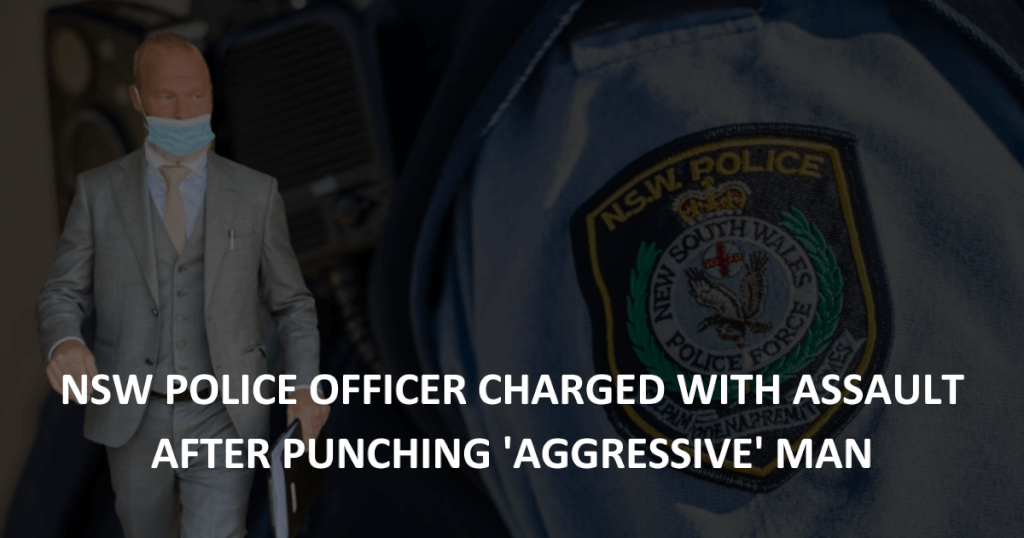 police assault: NSW Police officer charged with assault after punching 'aggressive' man