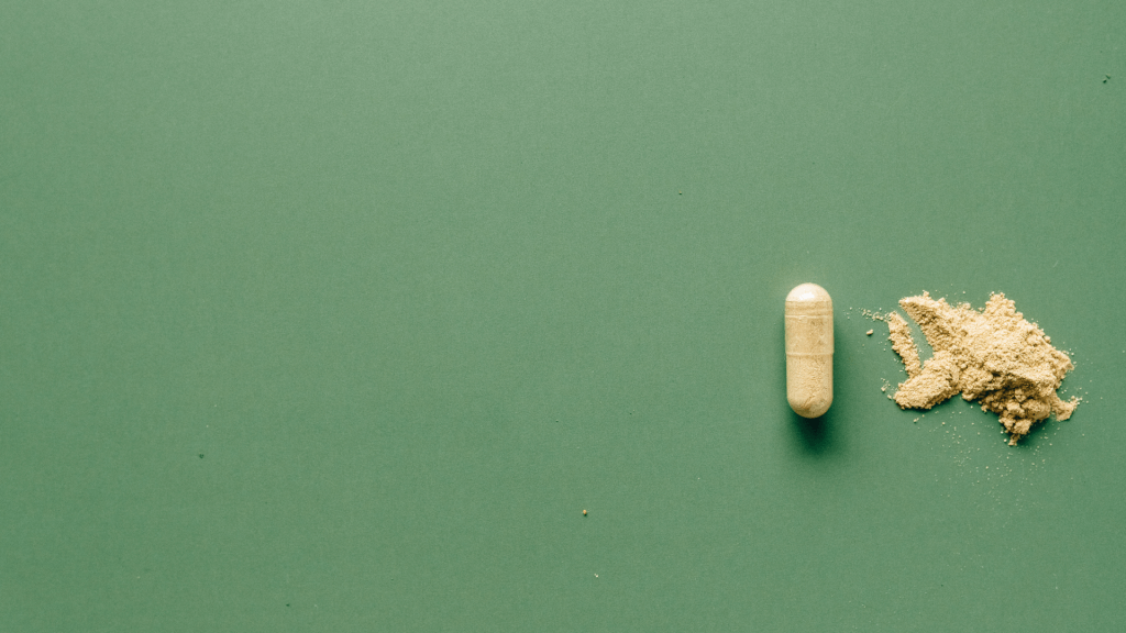 illegal drugs on green background