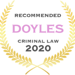 A gold laurel wreath surrounds the text "Recommended Doyles Criminal Law 2020" on a white background.