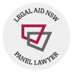 A circular logo with the text "Legal Aid NSW Panel Lawyer" surrounding two overlapping quadrilaterals, one maroon and one gray, in the center.