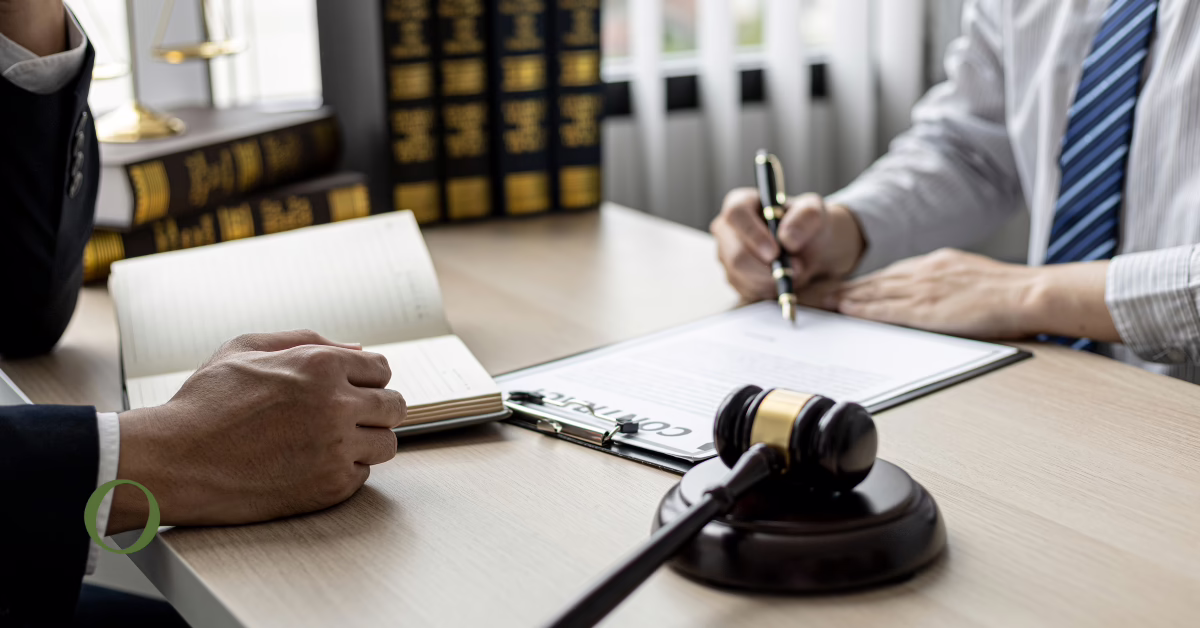 | O'BRIEN CRIMINAL & CIVIL SOLICITORS a lawyer's desk with paperwork and a gavel