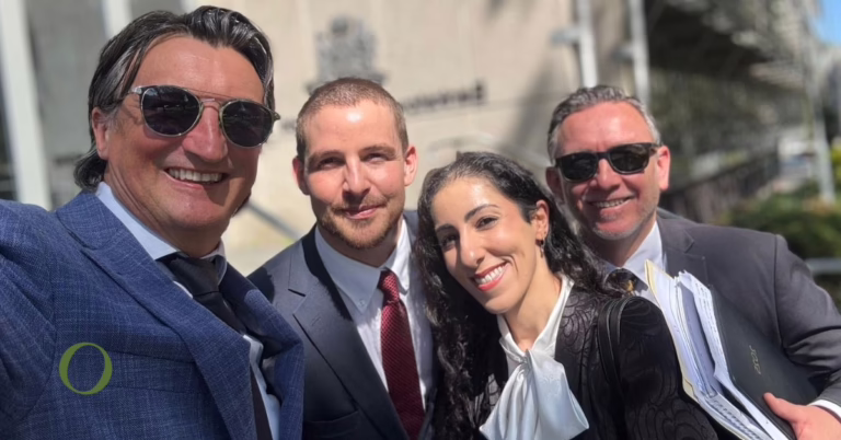 4 criminal lawyers smiling at camera in sydney