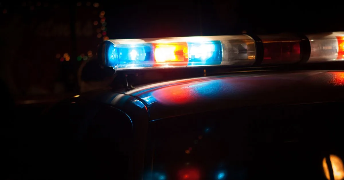 police car at nighttime with siren