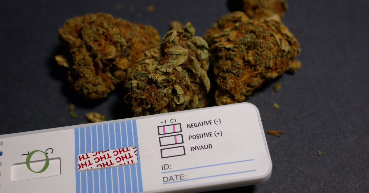 A drug test with illegal drugs in the background