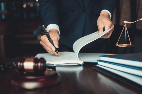 Lawyer writing No Win, No Fee cost agreements Lawyer writing No Win, No Fee cost agreements